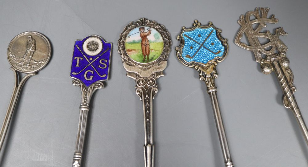 Six assorted golfing related silver teaspoons including three with enamel,